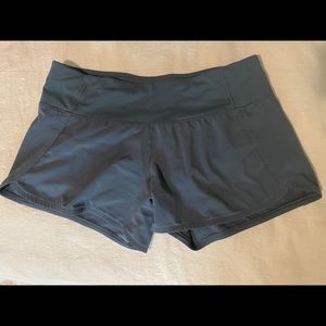 Lululemon Speed Up shorts 4” in teal. Size 8